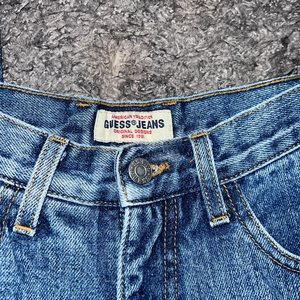 Guess denim blue jeans, straight leg, size 30.